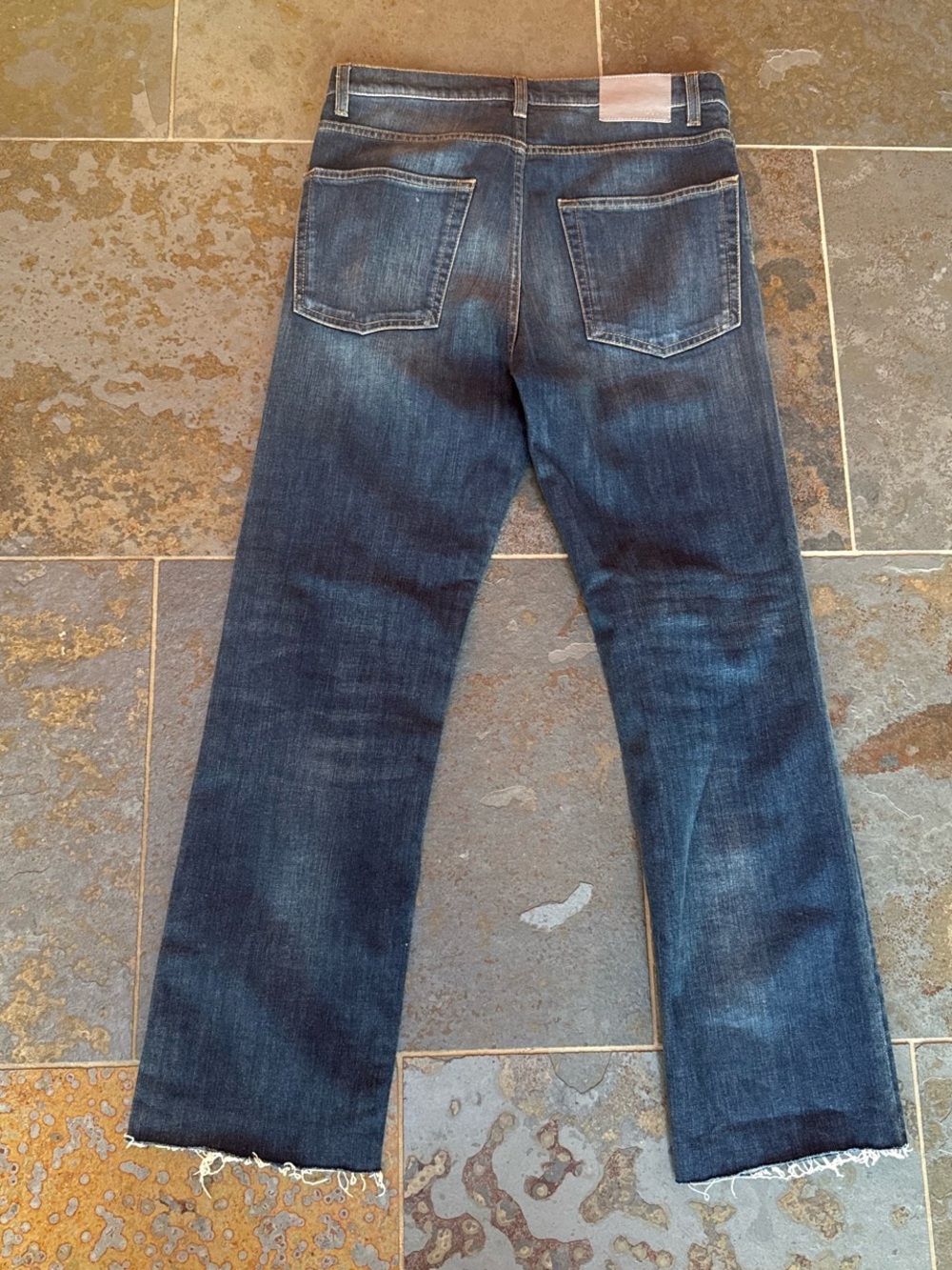 6397 Italy blue denim 495 jeans with frayed ham size 27. $395 MSRP.